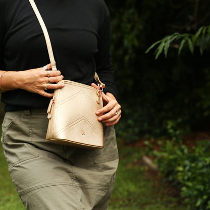 VERA MAY DAYNA GOLD VEGAN LEATHER HANDBAG