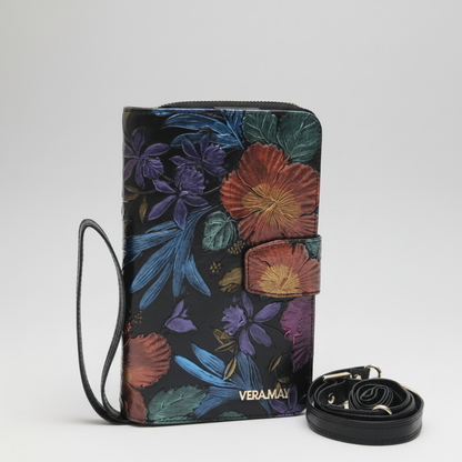 Floral-patterned bag with strap on a white background, featuring the brand 'VERAMAY'.